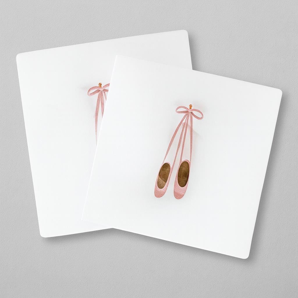 Two ballet themed dessert napkins iwth ballet shoes on a gray background