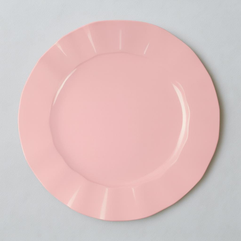 Pink high quality plastic dinner plate with gold edge on a gray background