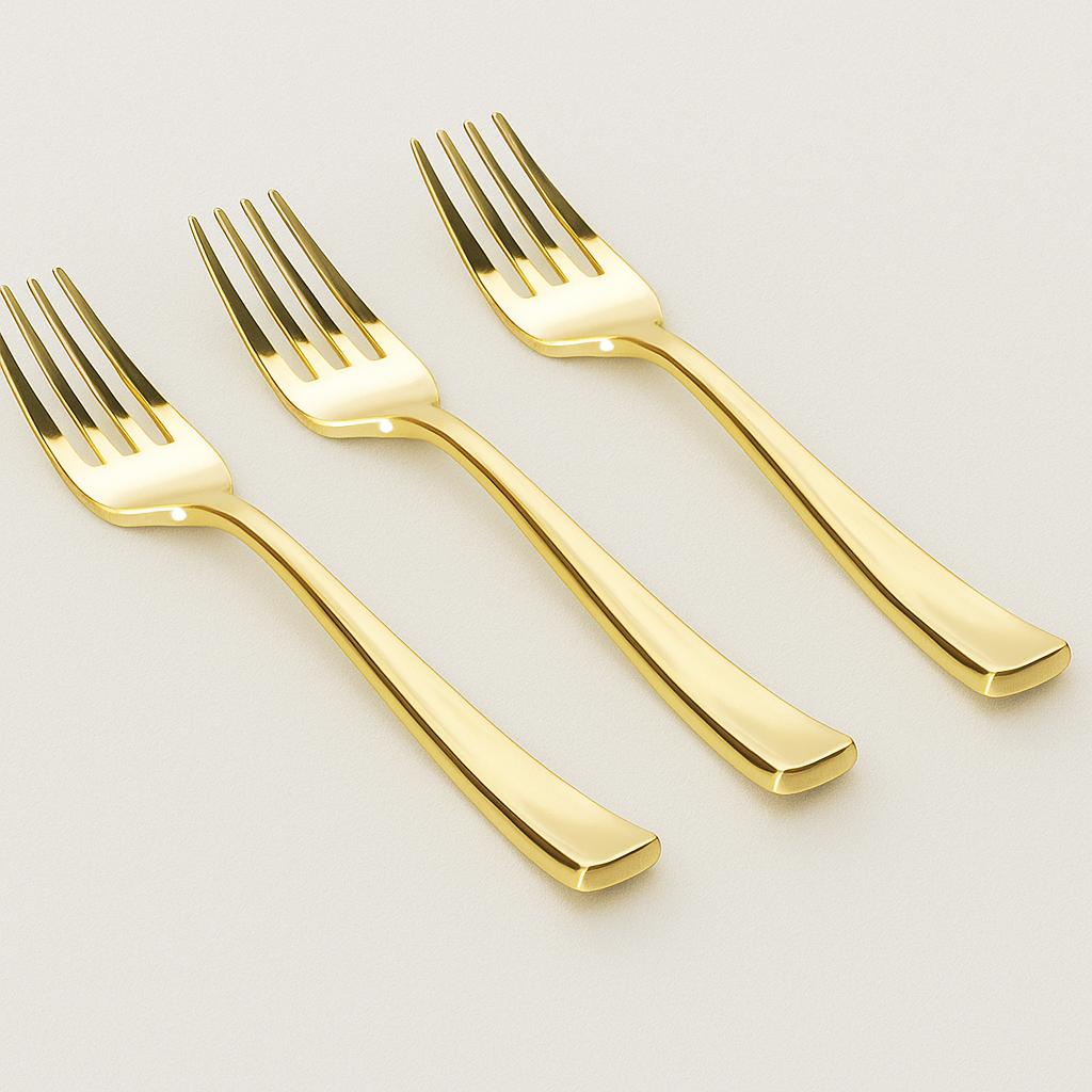 Set of four gold forks on a light gray background