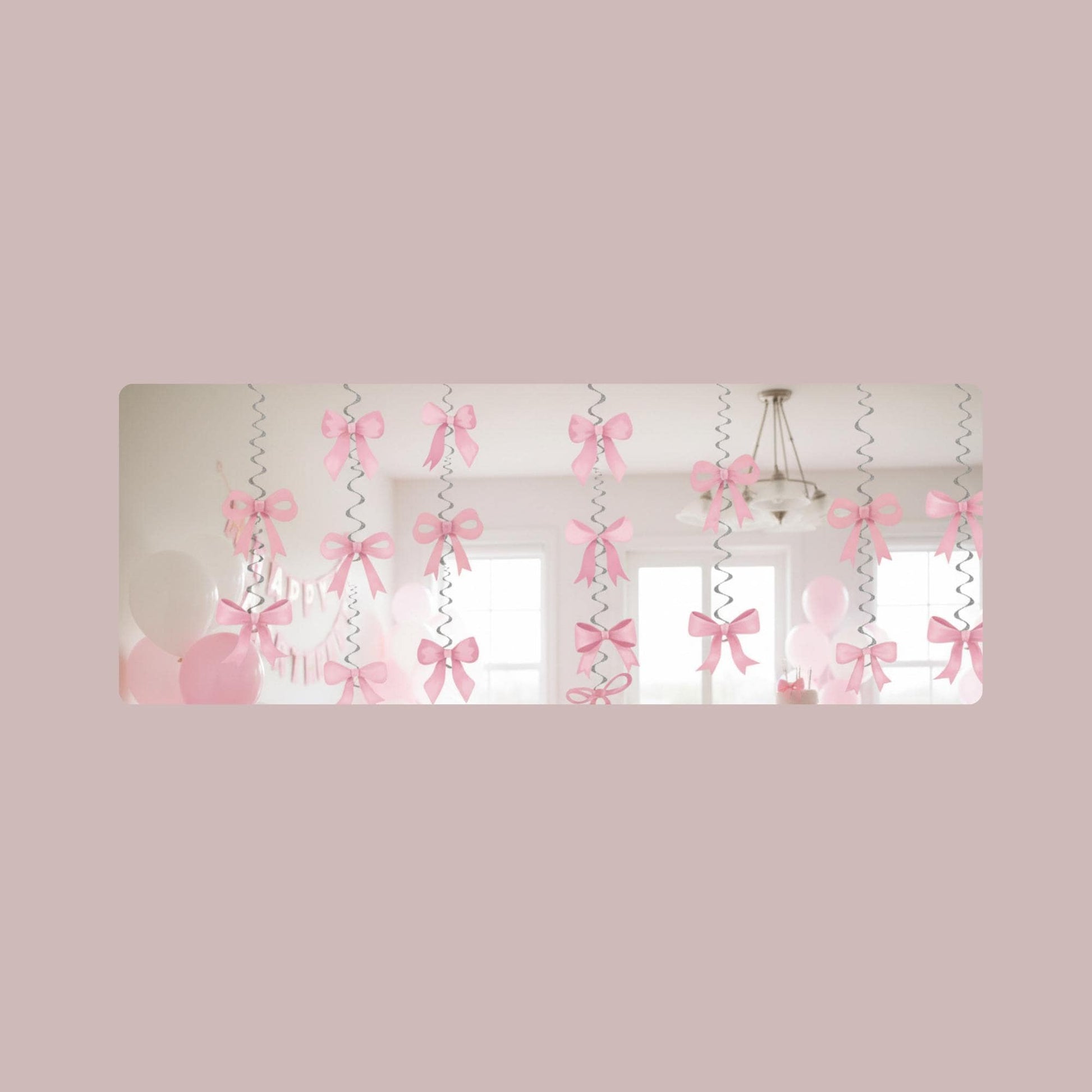 Pink Bow Swirl Decorations on a light pink background